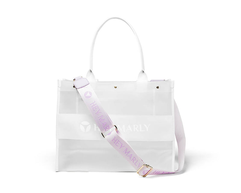HEY MARLY - NEW IN: TRANSPARENT SIGNATURE BAG! The Perfect Summer look is  here! 💜🤍 . . #heymarly #summer #summerstyle #bags #totebag #lilac  #bagstrap #signaturelook #ibiza #transparentbag #summervibes #beachbag